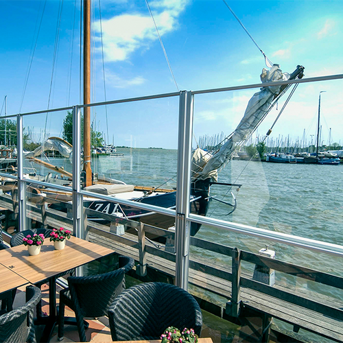 Mobiler Windschutz - Café au Lät - verschiebbare Windschutzfenster für Private und Gastronomie